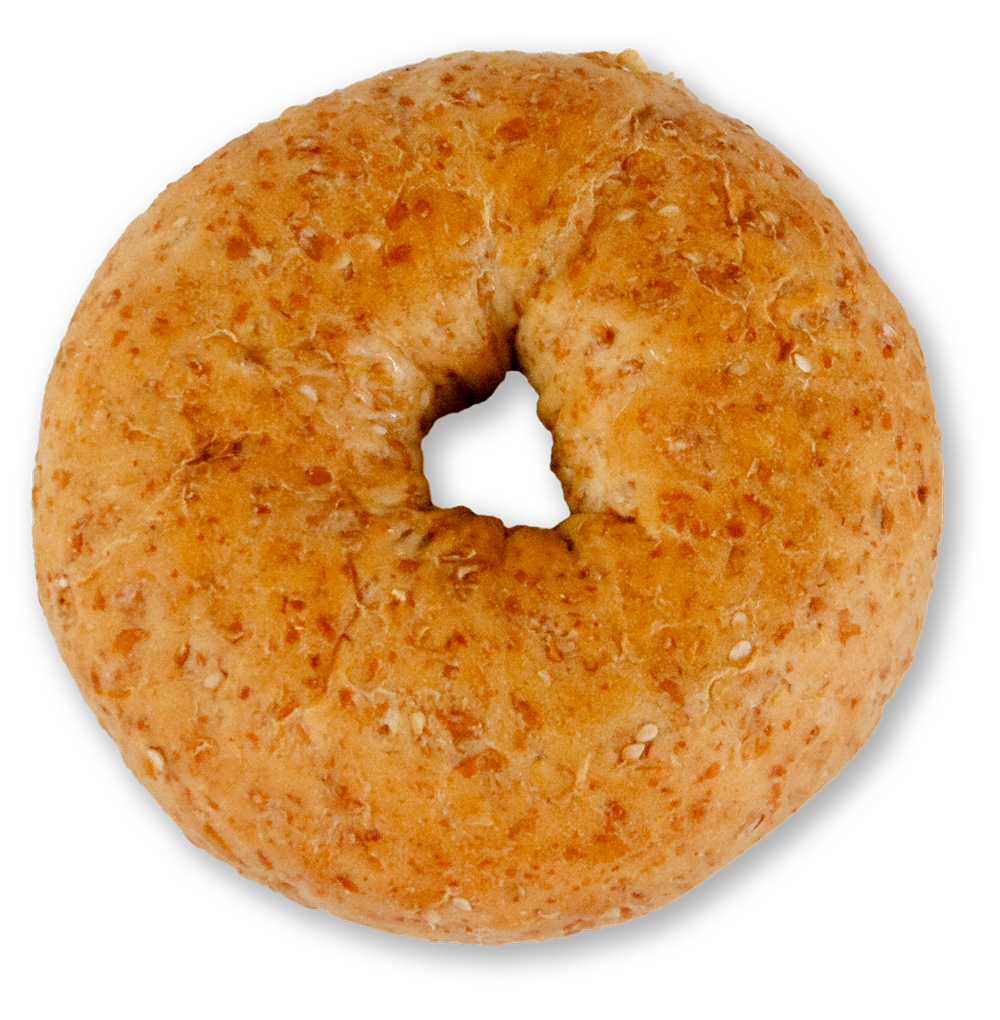 Slice of sprouted whole wheat sesame bagel on a white background