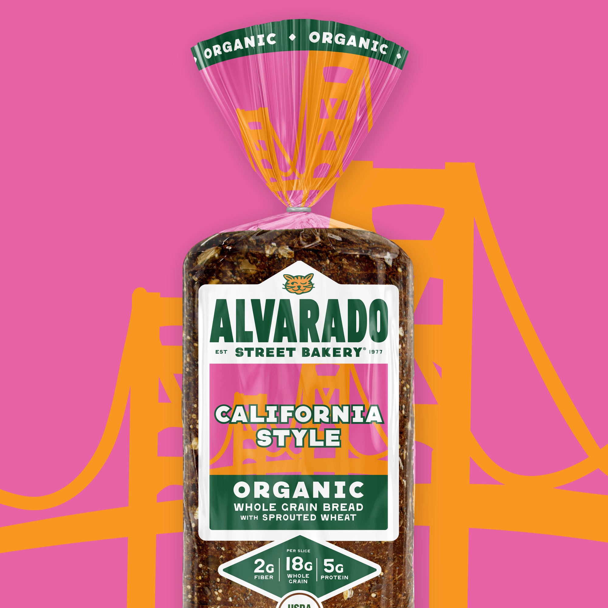 Alvarado Street Bakery bread package with a pink and orange bridge graphic in the background